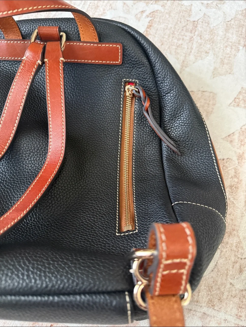 Dooney & Bourke Black Pebbled Leather Shoulder Bag with Brown Trim